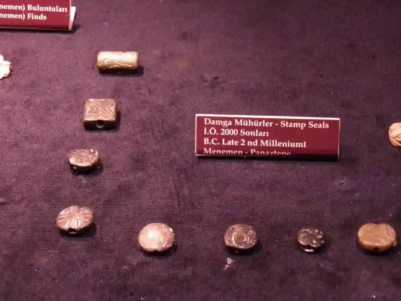 Circular stamp seals with cross design, 2nd millennium BC, located at Archaeological Museum of Izmir, Turkey